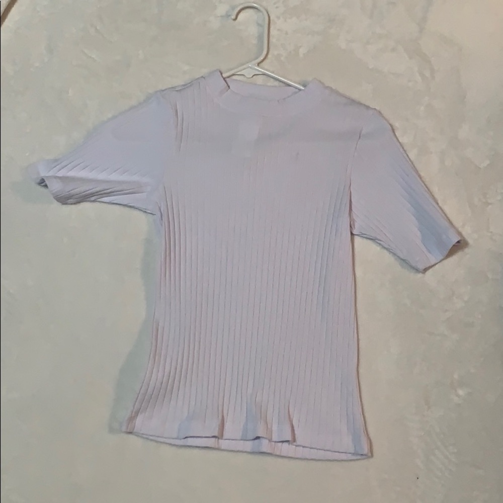 White shirt still with tags